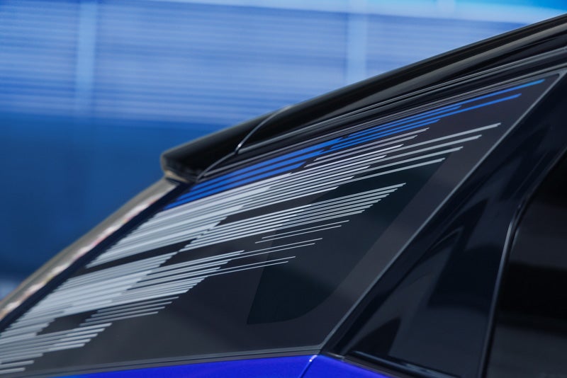 Close-up of the Modern Pattern on the 2026 OPTIQ-V Rear Quarter Glass | Serra Cadillac in Washington MI
